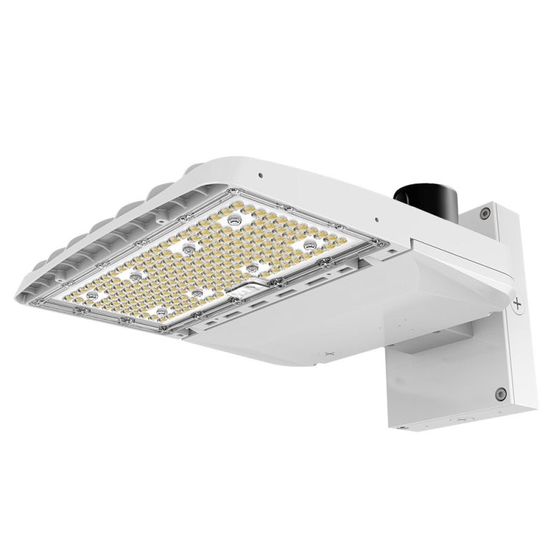 Konlite Vela I LED White Parking Lot Light with wall mount arm and photocell